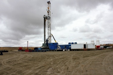 Drilling rig #129 in the Jonah Field near Pinedale Wyoming, operated by Encana Oil and Gas to produce natural gas for American Energy supplies.